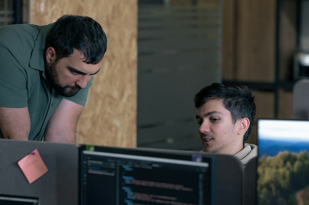 programmers collaborating on code